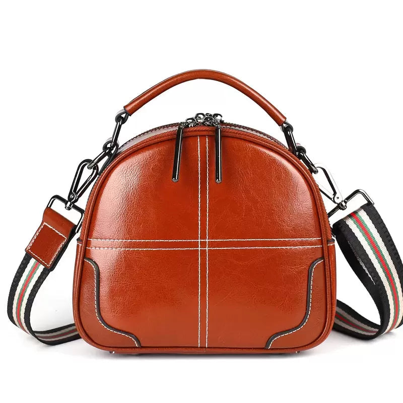 Natural cowhide fashion handbag