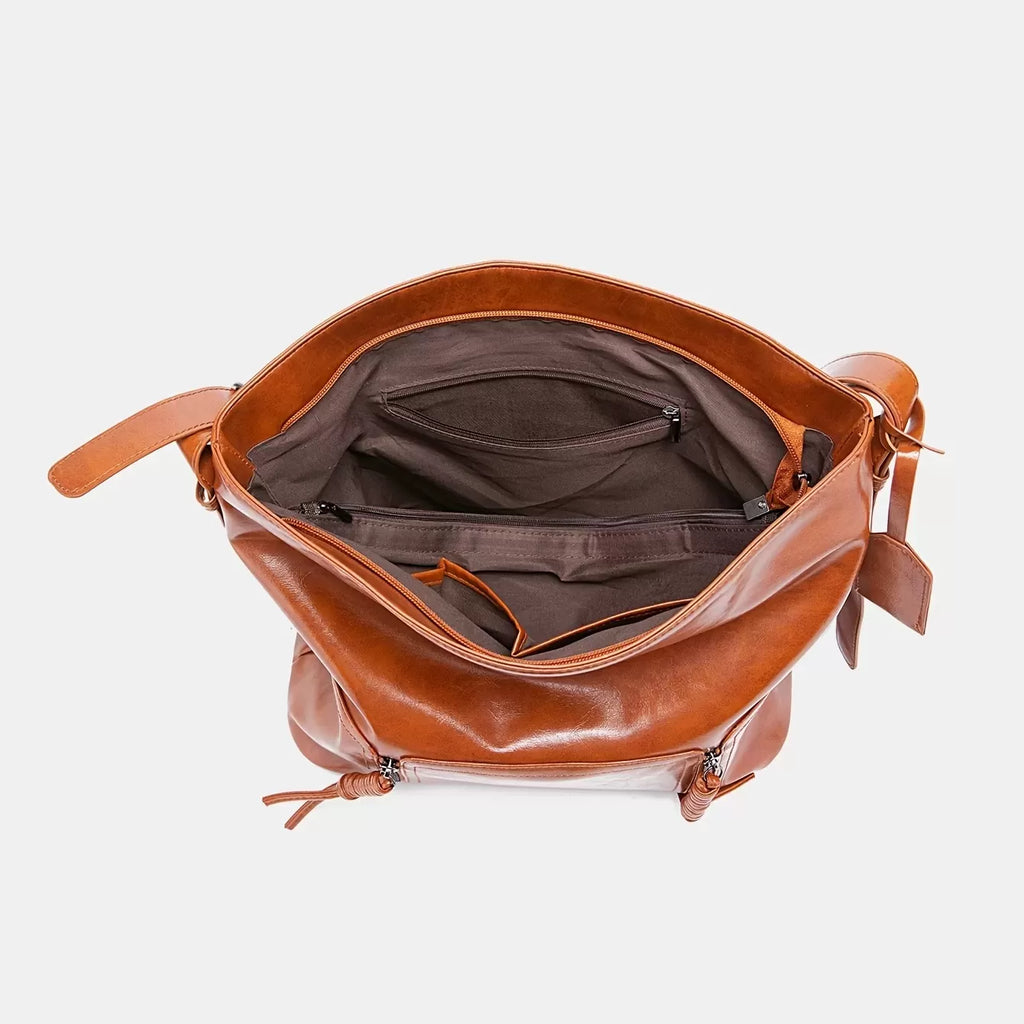 Retro versatile large capacity leather bag