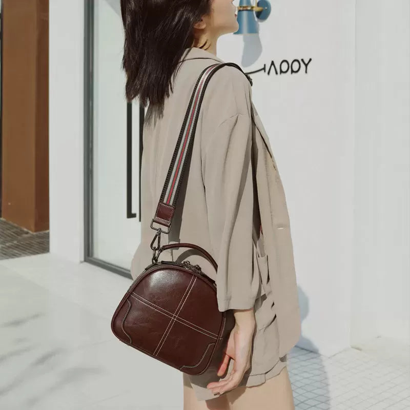 Natural cowhide fashion handbag