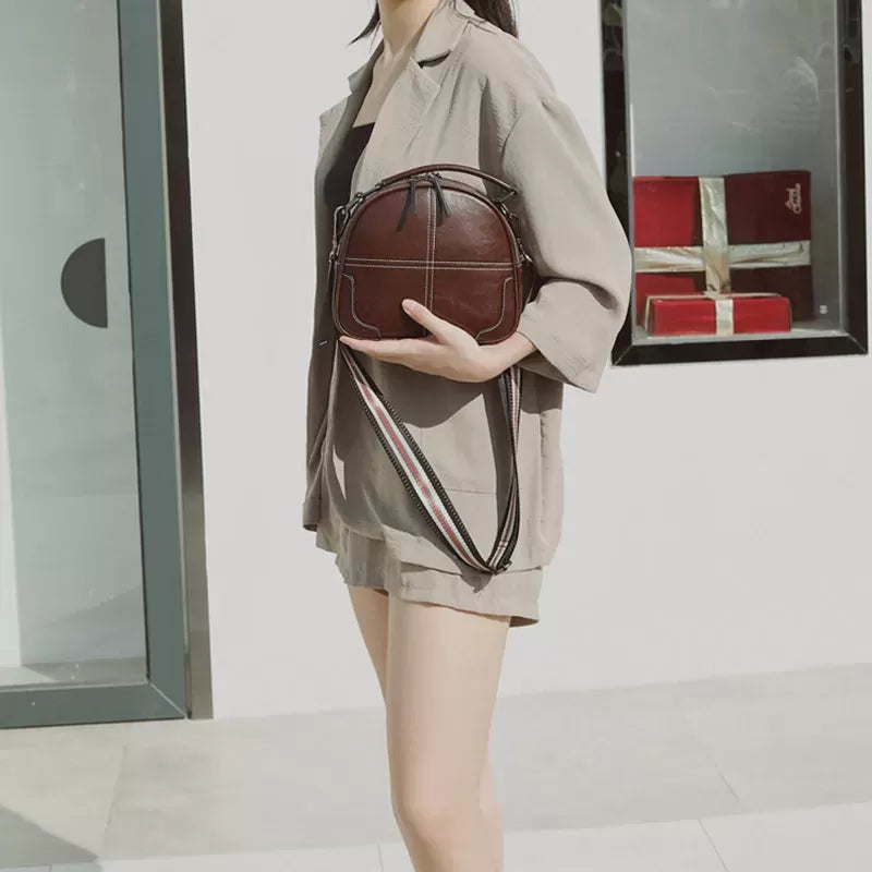 Natural cowhide fashion handbag