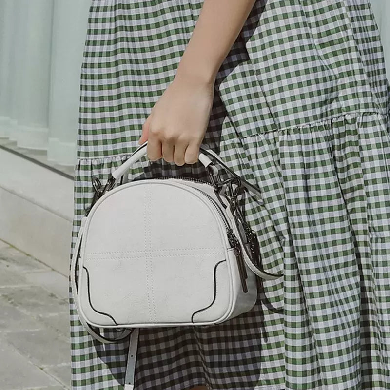 Natural cowhide fashion handbag