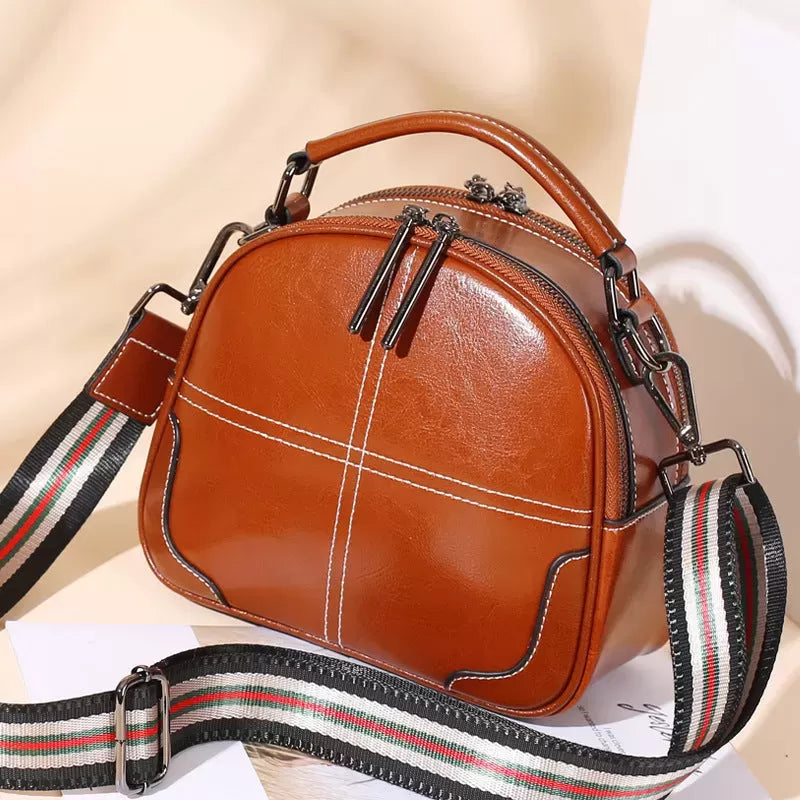 Natural cowhide fashion handbag