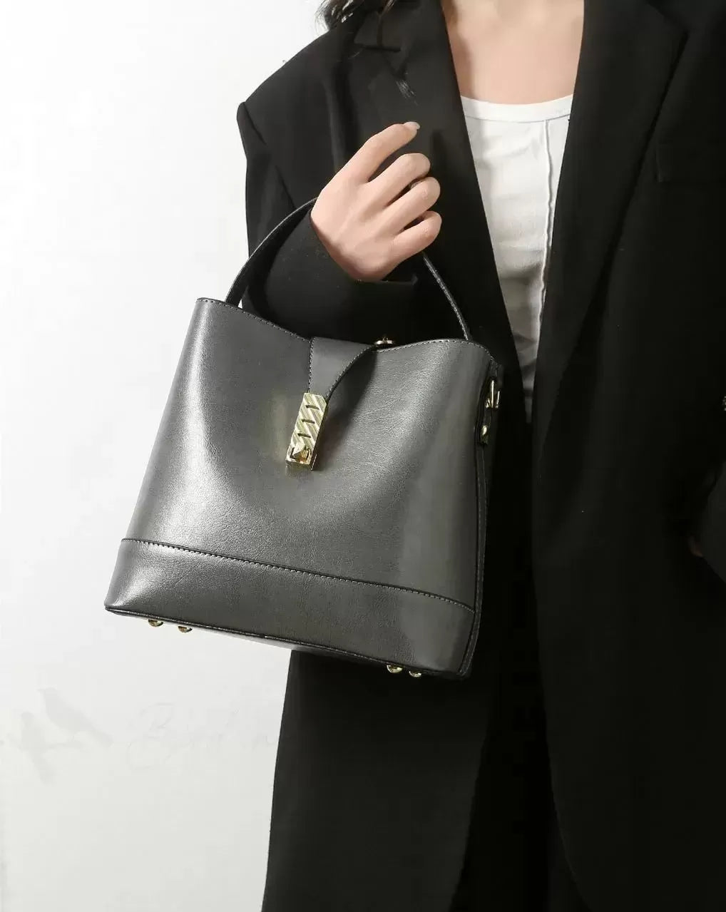 Sleek Snap Button Bucket Bag