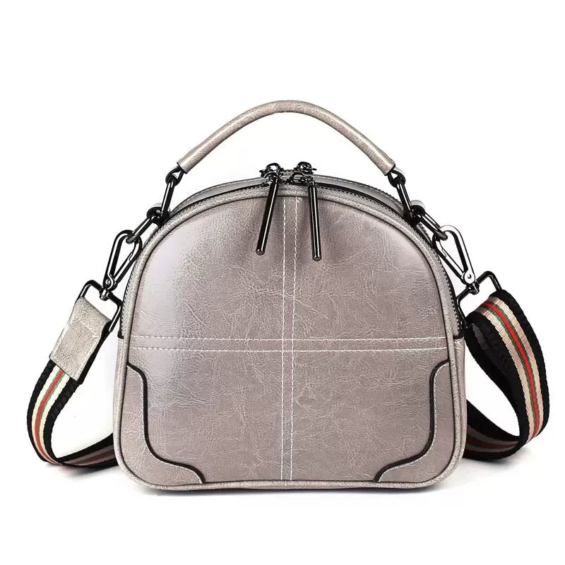 Natural cowhide fashion handbag
