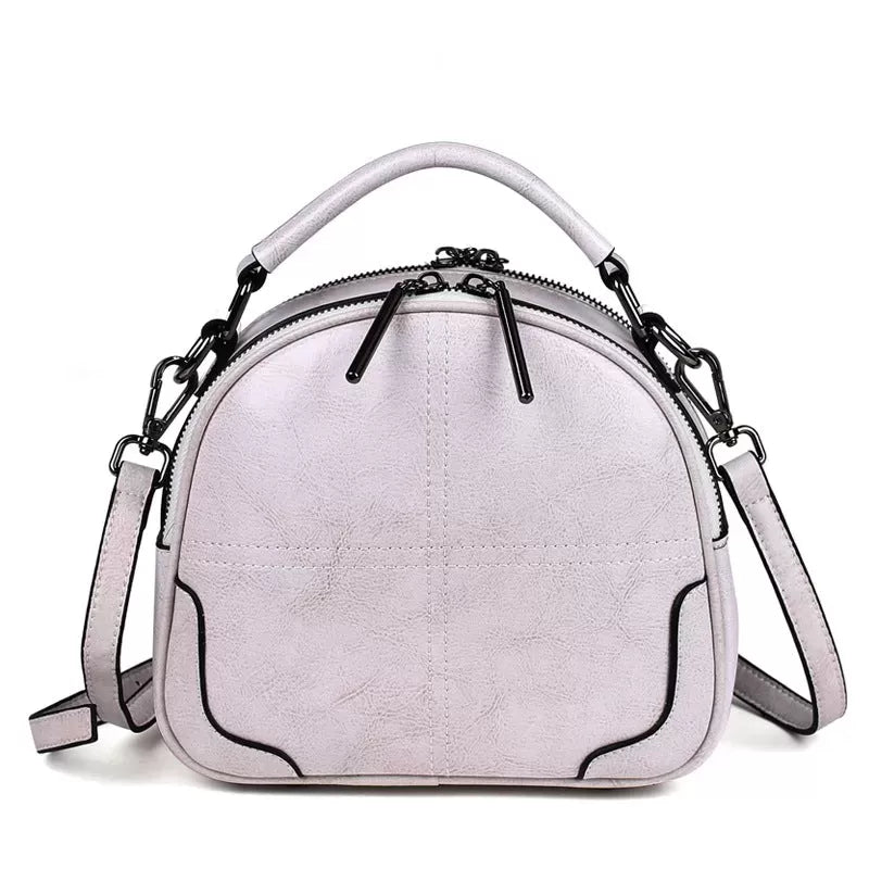 Natural cowhide fashion handbag