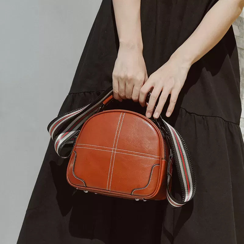 Natural cowhide fashion handbag
