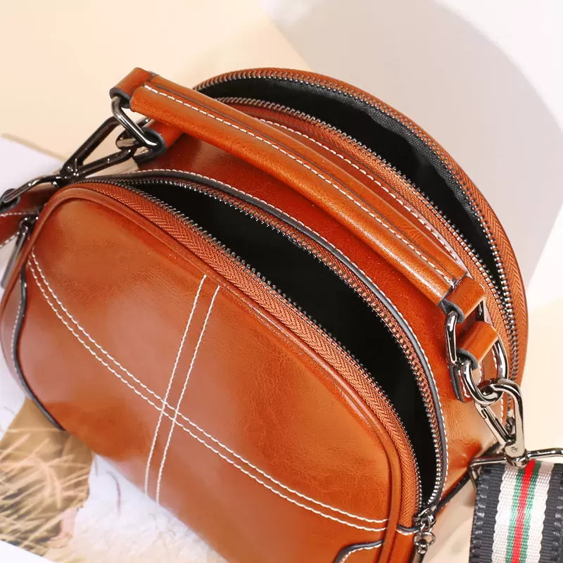 Natural cowhide fashion handbag
